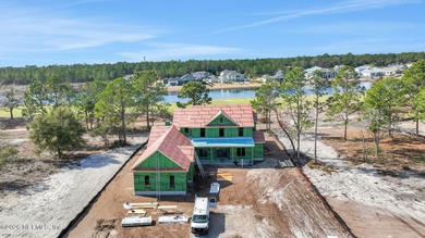 Welcome to an exceptional new construction home in the highly on Glen Kernan Golf and Country Club in Florida - for sale on GolfHomes.com, golf home, golf lot