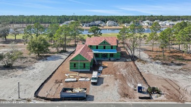 Welcome to an exceptional new construction home in the highly on Glen Kernan Golf and Country Club in Florida - for sale on GolfHomes.com, golf home, golf lot