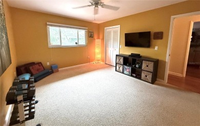 This classic Florida ranch-style home in desirable Bay Hill on Arnold Palmers Bay Hill Club and Lodge  in Florida - for sale on GolfHomes.com, golf home, golf lot