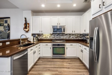 Experience refined townhome living in the heart of guard-gated on Grayhawk Golf Club  in Arizona - for sale on GolfHomes.com, golf home, golf lot