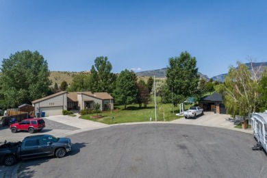 Situated on the ninth hole of the Olive Glenn Golf Course, 10 on Olive Glenn Golf and Country Club in Wyoming - for sale on GolfHomes.com, golf home, golf lot