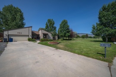 Situated on the ninth hole of the Olive Glenn Golf Course, 10 on Olive Glenn Golf and Country Club in Wyoming - for sale on GolfHomes.com, golf home, golf lot