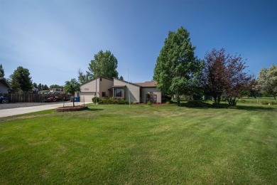 Situated on the ninth hole of the Olive Glenn Golf Course, 10 on Olive Glenn Golf and Country Club in Wyoming - for sale on GolfHomes.com, golf home, golf lot