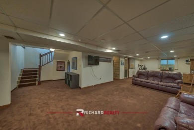 Situated on the ninth hole of the Olive Glenn Golf Course, 10 on Olive Glenn Golf and Country Club in Wyoming - for sale on GolfHomes.com, golf home, golf lot