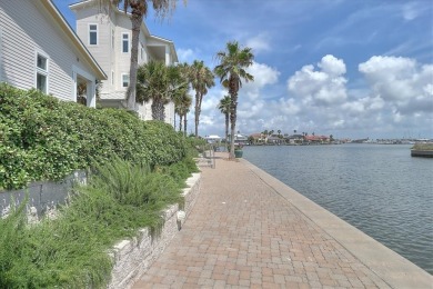 Such a STUNNING COAST CONDO! Turnkey with elevator, boat lift on Palmilla Beach Golf Club in Texas - for sale on GolfHomes.com, golf home, golf lot