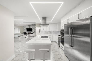 Stunning remodeled 4BR, 3.5BA home with breathtaking golf views on  in Florida - for sale on GolfHomes.com, golf home, golf lot