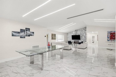 Stunning remodeled 4BR, 3.5BA home with breathtaking golf views on  in Florida - for sale on GolfHomes.com, golf home, golf lot