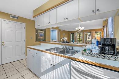 Tucked inside the gated, tree-lined entrance of Pawleys on Pawleys Plantation Golf and Country Club in South Carolina - for sale on GolfHomes.com, golf home, golf lot