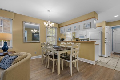 Tucked inside the gated, tree-lined entrance of Pawleys on Pawleys Plantation Golf and Country Club in South Carolina - for sale on GolfHomes.com, golf home, golf lot