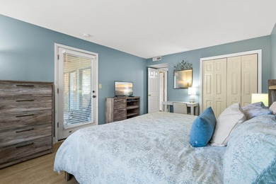 Tucked inside the gated, tree-lined entrance of Pawleys on Pawleys Plantation Golf and Country Club in South Carolina - for sale on GolfHomes.com, golf home, golf lot