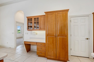 Private lakefront oasis in the gated community of Sabal Creek on The Golf Club At Cypress Head in Florida - for sale on GolfHomes.com, golf home, golf lot