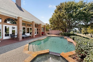 Stunning updated 4-bed, 3-bath home on golf course lot in highly on Stonebridge Ranch Country Club in Texas - for sale on GolfHomes.com, golf home, golf lot