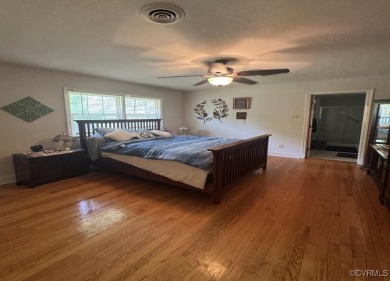 Situated on 2.69 acres of a well-manicured lot complete with a on Mill Quarter Plantation Country Club in Virginia - for sale on GolfHomes.com, golf home, golf lot