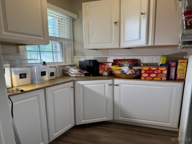 Situated on 2.69 acres of a well-manicured lot complete with a on Mill Quarter Plantation Country Club in Virginia - for sale on GolfHomes.com, golf home, golf lot