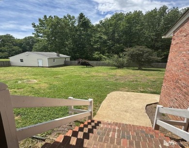 Situated on 2.69 acres of a well-manicured lot complete with a on Mill Quarter Plantation Country Club in Virginia - for sale on GolfHomes.com, golf home, golf lot