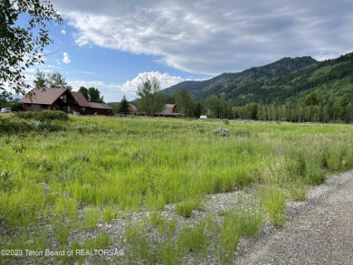 Outstanding, unobstructed views of the mountains! This .64 acre on Cedar Creek Golf Course in Wyoming - for sale on GolfHomes.com, golf home, golf lot