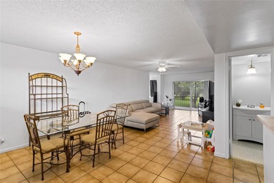 Beautifully maintained top-floor unit in sought-after Hollybrook on Hollybrook Golf and Tennis Club  in Florida - for sale on GolfHomes.com, golf home, golf lot