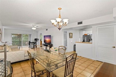 Beautifully maintained top-floor unit in sought-after Hollybrook on Hollybrook Golf and Tennis Club  in Florida - for sale on GolfHomes.com, golf home, golf lot