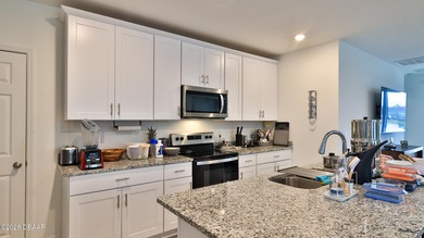 Want to Take Life Easy? Then this beautifully upgraded 4-bedroom on LPGA International Golf Course in Florida - for sale on GolfHomes.com, golf home, golf lot