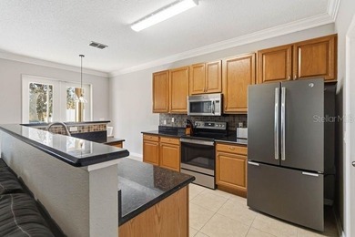 Under contract-accepting backup offers. Welcome home to this on Royal St. Cloud Golf Links in Florida - for sale on GolfHomes.com, golf home, golf lot