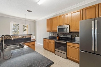 Under contract-accepting backup offers. Welcome home to this on Royal St. Cloud Golf Links in Florida - for sale on GolfHomes.com, golf home, golf lot