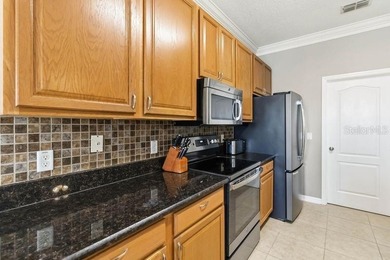 Under contract-accepting backup offers. Welcome home to this on Royal St. Cloud Golf Links in Florida - for sale on GolfHomes.com, golf home, golf lot