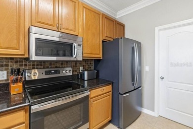 Under contract-accepting backup offers. Welcome home to this on Royal St. Cloud Golf Links in Florida - for sale on GolfHomes.com, golf home, golf lot