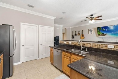 Under contract-accepting backup offers. Welcome home to this on Royal St. Cloud Golf Links in Florida - for sale on GolfHomes.com, golf home, golf lot