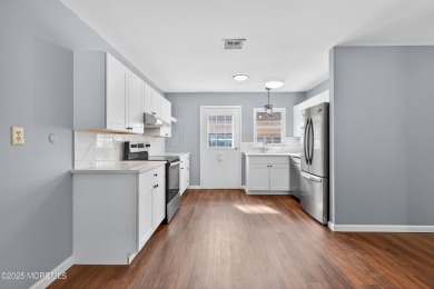 Come see this Beautifully Renovated Marlborough End-Unit Condo on Greenbriar Woodlands in New Jersey - for sale on GolfHomes.com, golf home, golf lot