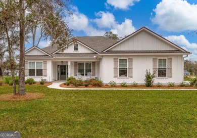 Immaculate Joss Josselyn Home in Desirable Sanctuary Cove on The Golf Club At Sanctuary Cove in Georgia - for sale on GolfHomes.com, golf home, golf lot