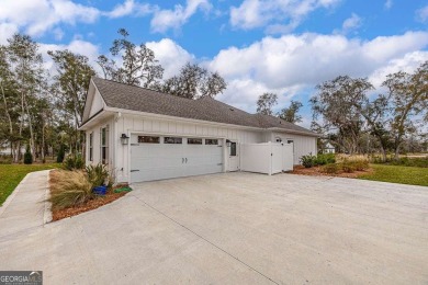 Immaculate Joss Josselyn Home in Desirable Sanctuary Cove on The Golf Club At Sanctuary Cove in Georgia - for sale on GolfHomes.com, golf home, golf lot