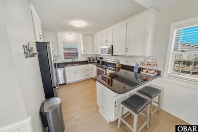 Whether your perfect day includes sandy toes at the beach or on The Currituck Golf Club in North Carolina - for sale on GolfHomes.com, golf home, golf lot