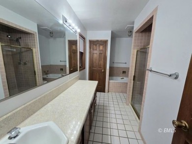 This large, contemporary family residence boasts five bedrooms on Miles City Town and Country Club in Montana - for sale on GolfHomes.com, golf home, golf lot