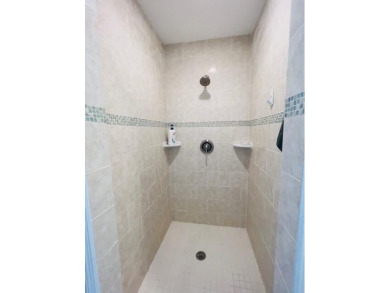 2 bedroom, 2.5 baths, overlooking golf course, tile floors on Eastpointe Country Club in Florida - for sale on GolfHomes.com, golf home, golf lot