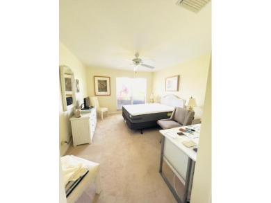 2 bedroom, 2.5 baths, overlooking golf course, tile floors on Eastpointe Country Club in Florida - for sale on GolfHomes.com, golf home, golf lot