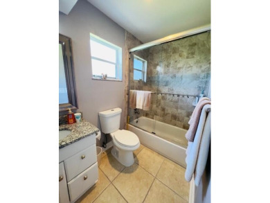2 bedroom, 2.5 baths, overlooking golf course, tile floors on Eastpointe Country Club in Florida - for sale on GolfHomes.com, golf home, golf lot