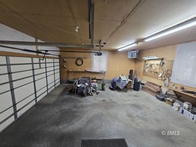 This large, contemporary family residence boasts five bedrooms on Miles City Town and Country Club in Montana - for sale on GolfHomes.com, golf home, golf lot