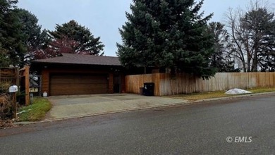 This large, contemporary family residence boasts five bedrooms on Miles City Town and Country Club in Montana - for sale on GolfHomes.com, golf home, golf lot