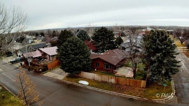 This large, contemporary family residence boasts five bedrooms on Miles City Town and Country Club in Montana - for sale on GolfHomes.com, golf home, golf lot