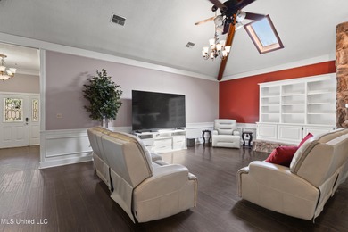 Experience timeless elegance and custom craftsmanship in this on Diamondhead Country Club in Mississippi - for sale on GolfHomes.com, golf home, golf lot