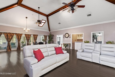 Experience timeless elegance and custom craftsmanship in this on Diamondhead Country Club in Mississippi - for sale on GolfHomes.com, golf home, golf lot