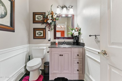 Experience timeless elegance and custom craftsmanship in this on Diamondhead Country Club in Mississippi - for sale on GolfHomes.com, golf home, golf lot