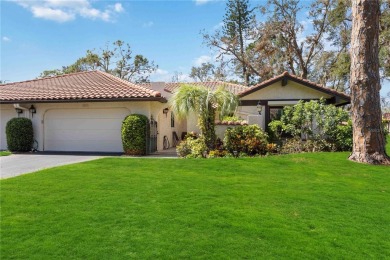 Tranquil, spotless, and effortlessly inviting, this on Palm Aire Country Club of Sarasota in Florida - for sale on GolfHomes.com, golf home, golf lot