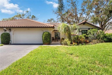 Tranquil, spotless, and effortlessly inviting, this on Palm Aire Country Club of Sarasota in Florida - for sale on GolfHomes.com, golf home, golf lot