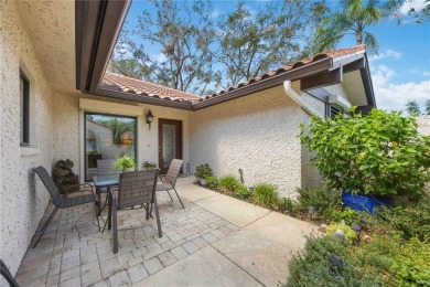 Tranquil, spotless, and effortlessly inviting, this on Palm Aire Country Club of Sarasota in Florida - for sale on GolfHomes.com, golf home, golf lot