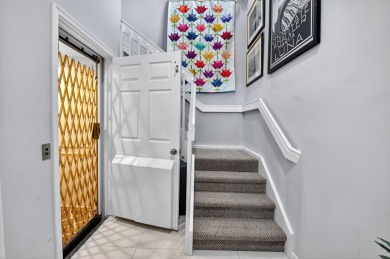 RARELY AVAILABLE 2nd floor coach home with interior elevator on  in Florida - for sale on GolfHomes.com, golf home, golf lot