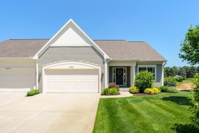 Enjoy easy living just steps from Angels Crossing Golf Course in on Angels Crossing Golf Club in Michigan - for sale on GolfHomes.com, golf home, golf lot