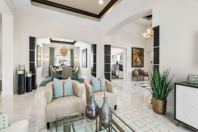Discover luxury living in BallenIsles Country Club with a golf on BallenIsles Golf and Country Club in Florida - for sale on GolfHomes.com, golf home, golf lot