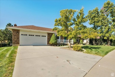 Welcome home! This beautiful 6 bedroom, 3 bath home is nestled on Davis Park Golf Course in Utah - for sale on GolfHomes.com, golf home, golf lot