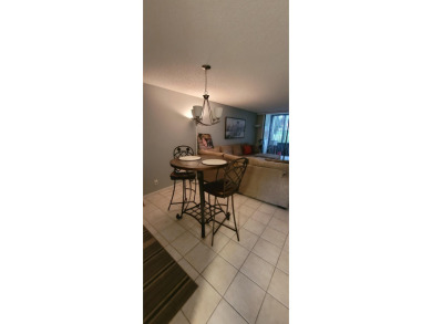 Desirable first floor 2/2 condo in The Fountains Country Club on Fountains Golf and Country Club in Florida - for sale on GolfHomes.com, golf home, golf lot